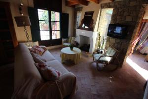 A seating area at Rocasol - rustic finca for nature lovers in Benissa