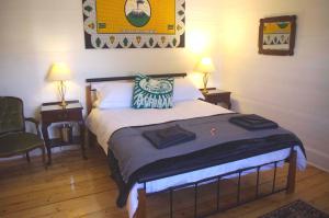 Katil atau katil-katil dalam bilik di Darcy's Cottage on Piper