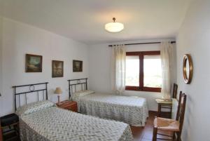 Postel nebo postele na pokoji v ubytování Club Villamar - Anabel