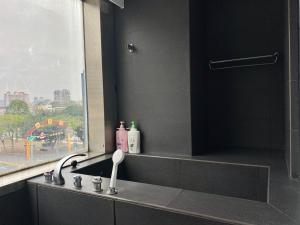 Fotografie z fotogalerie ubytování Love River Inn 愛河日央 v destinaci Kao-siung