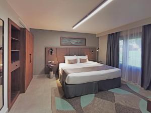 Postel nebo postele na pokoji v ubytování Marbella Resort