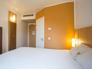Voodi või voodid majutusasutuse Ibis Lagos Airport toas