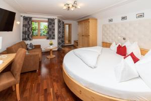 Posteľ alebo postele v izbe v ubytovaní Hotel Zimmerbräu