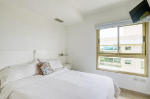 Postel nebo postele na pokoji v ubytování Albar Club de Mar