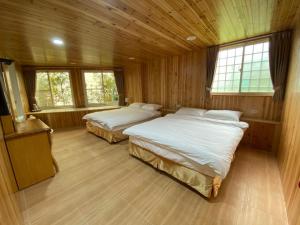 Katil atau katil-katil dalam bilik di Green incense Homestay