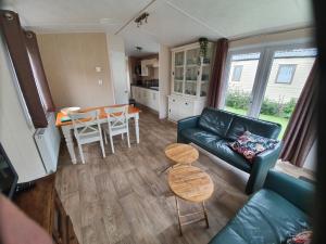 Χώρος καθιστικού στο Vakantiepark Kijkduin - 711