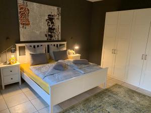Postel nebo postele na pokoji v ubytování Luxus-Apartment Quierschied