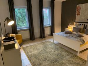 Postel nebo postele na pokoji v ubytování Luxus-Apartment Quierschied