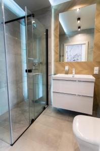 Kúpeľňa v ubytovaní Apartament Małopanewska Wrocław Centrum