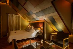 Postel nebo postele na pokoji v ubytování Hotel La Casueña