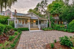 a house with a brick driveway in front of it at The Beaufort Inn in Beaufort