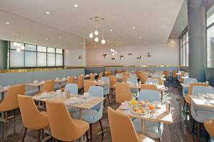 Restaurace v ubytování Residhome Puteaux La défense + 25 fotografií