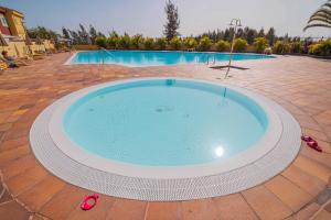 Der Swimmingpool an oder in der Nähe von Memorable Holidays With Your Family