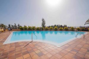 Der Swimmingpool an oder in der Nähe von Memorable Holidays With Your Family