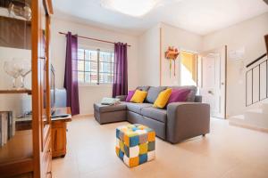 Ein Sitzbereich in der Unterkunft Memorable Holidays With Your Family