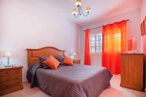 Ein Bett oder Betten in einem Zimmer der Unterkunft Memorable Holidays With Your Family