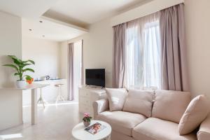 Et tv og/eller underholdning på Ollihomes Relaxury Apartment