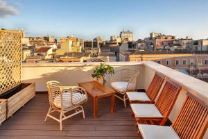 En balkon eller terrasse på Ollihomes Relaxury Apartment