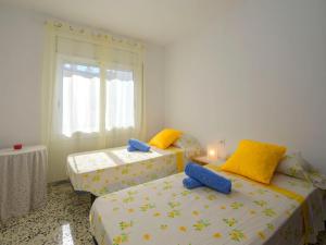 Posteľ alebo postele v izbe v ubytovaní Apartment Costa Playa by Interhome