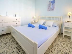 Posteľ alebo postele v izbe v ubytovaní Apartment Costa Playa by Interhome