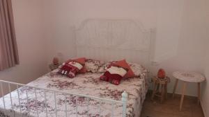 מיטה או מיטות בחדר ב-Apartment Edita