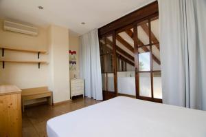 Cama o camas de una habitación en Club Villamar - Caipirinha