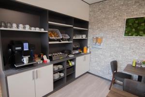 Kuchyň nebo kuchyňský kout v ubytování Villa Kopp-Das Gästehaus + 21 fotografií