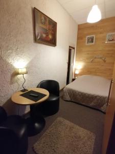 Postel nebo postele na pokoji v ubytování Le Liège