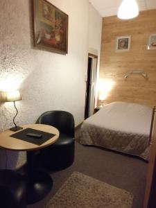 Postel nebo postele na pokoji v ubytování Le Liège