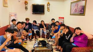 a group of people sitting on a couch at Tuk Tuk Backpackers- Near Jaipur Train Station in Jaipur +42 photos