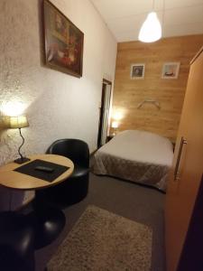 Postel nebo postele na pokoji v ubytování Le Liège