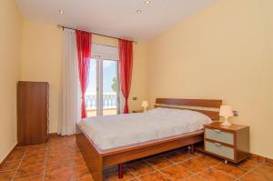 Postel nebo postele na pokoji v ubytování Club Villamar - La Venta