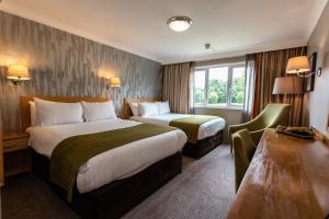 Postel nebo postele na pokoji v ubytování Holiday Inn A55 Chester West by IHG + 111 fotografií