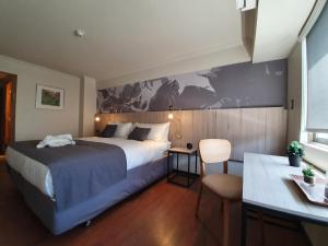 Tempat tidur dalam kamar di Hotel Brasilia