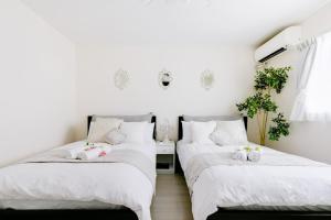 Katil atau katil-katil dalam bilik di Osaka - House / Vacation STAY 74031