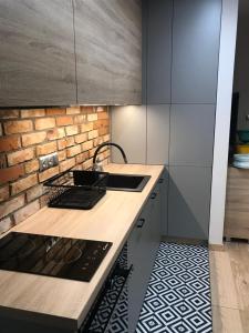 Kuchyňa alebo kuchynka v ubytovaní Apartament Bojary