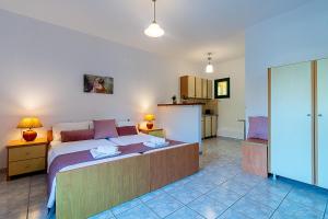 Posteľ alebo postele v izbe v ubytovaní Rivendell Apartments