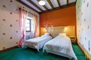 Postel nebo postele na pokoji v ubytování Gîte Scopa