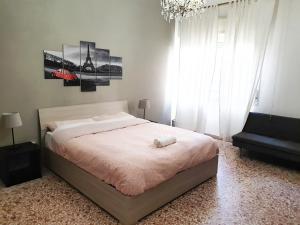 Postel nebo postele na pokoji v ubytování Il Secondo Piano