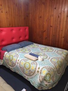 Кровать или кровати в номере cabaña amoblada independiente, sector regional