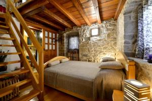 Postel nebo postele na pokoji v ubytování Apartments Salvezani