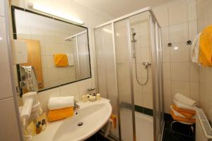 Ein Badezimmer in der Unterkunft Hotel Tristkogel