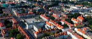 an aerial view of a city with buildings at Rynek Staromiejski Apartment in Koszalin