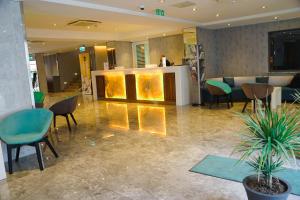 TV a/nebo společenská místnost v ubytování Pebbles Resort