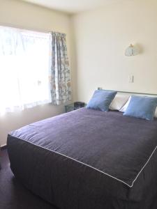 Postel nebo postele na pokoji v ubytování Bentons Motel