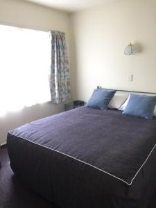 Postel nebo postele na pokoji v ubytování Bentons Motel