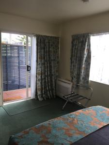 Postel nebo postele na pokoji v ubytování Bentons Motel