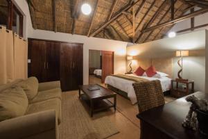 Katil atau katil-katil dalam bilik di Pilanesberg Private Lodge