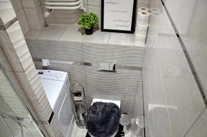 Een badkamer bij Apartament DeLuxe 1