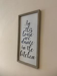 a picture of a quote in a frame on a wall at The Salisbury Townhouse in Salisbury